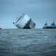 Illustration for article titled These Photos Of That Grounded Car Carrier Ship Are Beautifully Surreal